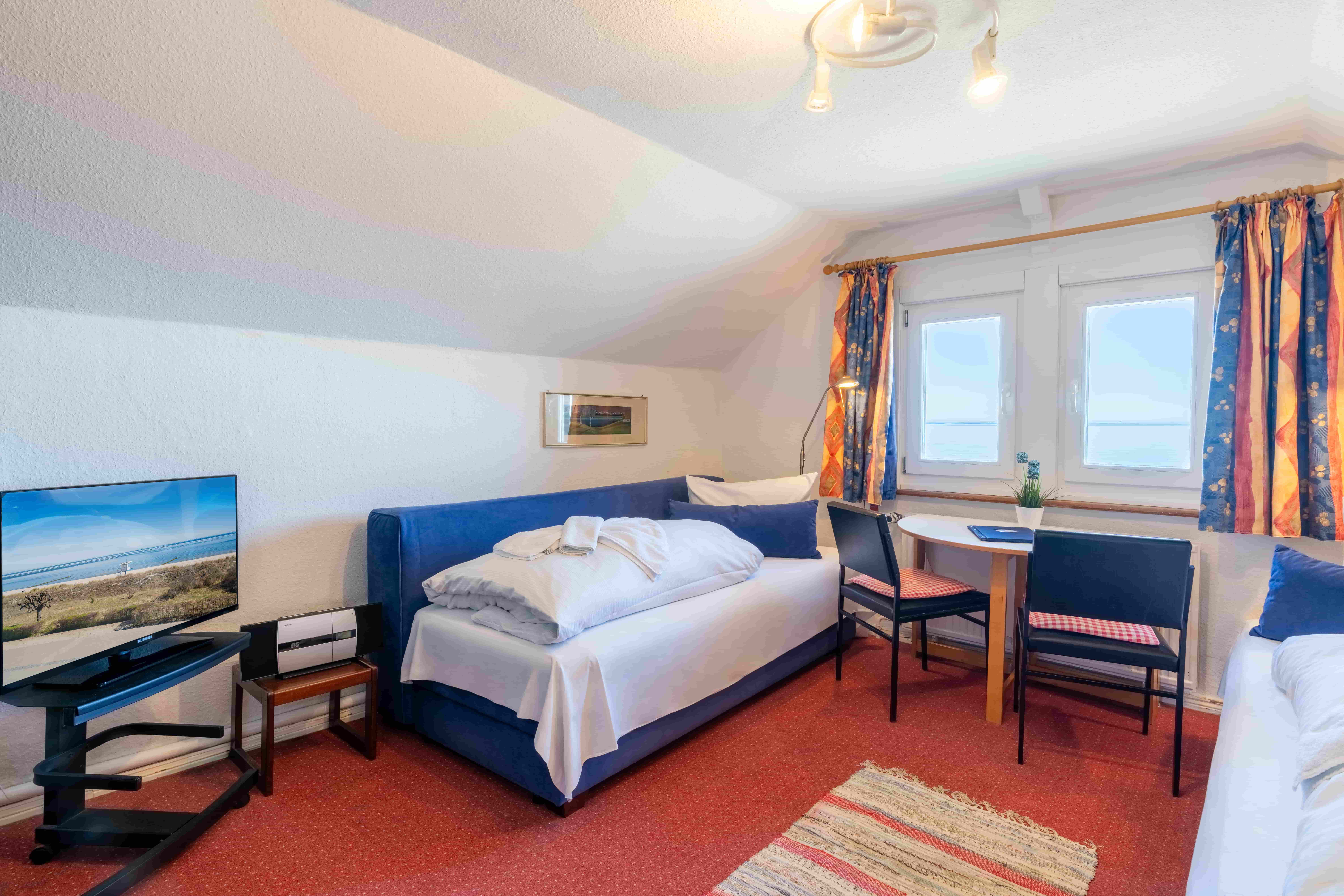 Dachgeschosswohnung in der Strandvilla Bansin, Wohnraum mit Meerblick